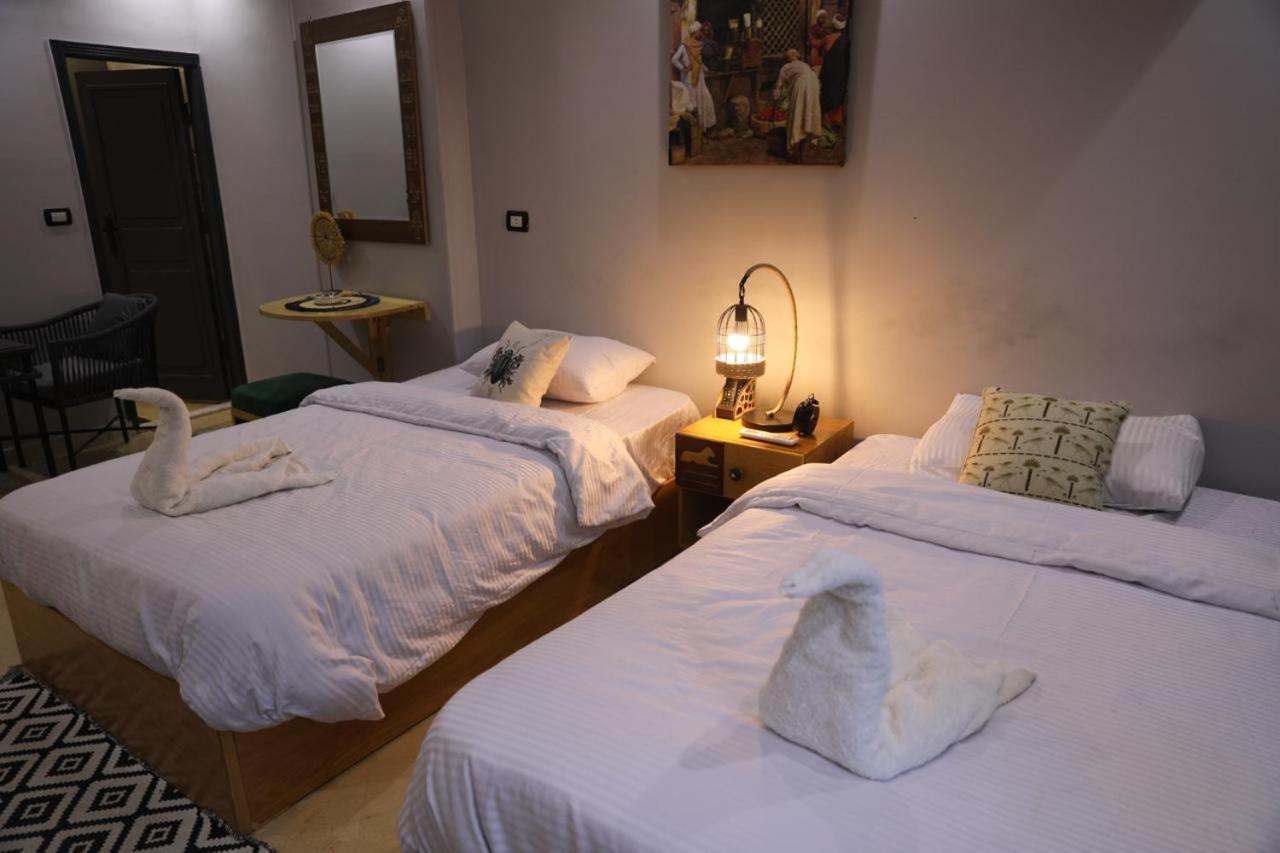 קהיר King Tout Hotel Pyramids View מראה חיצוני תמונה